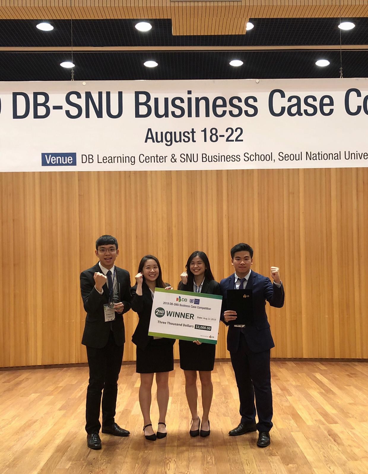 Photo of Jason and teammate winning the DB-SNU Business Case Competition